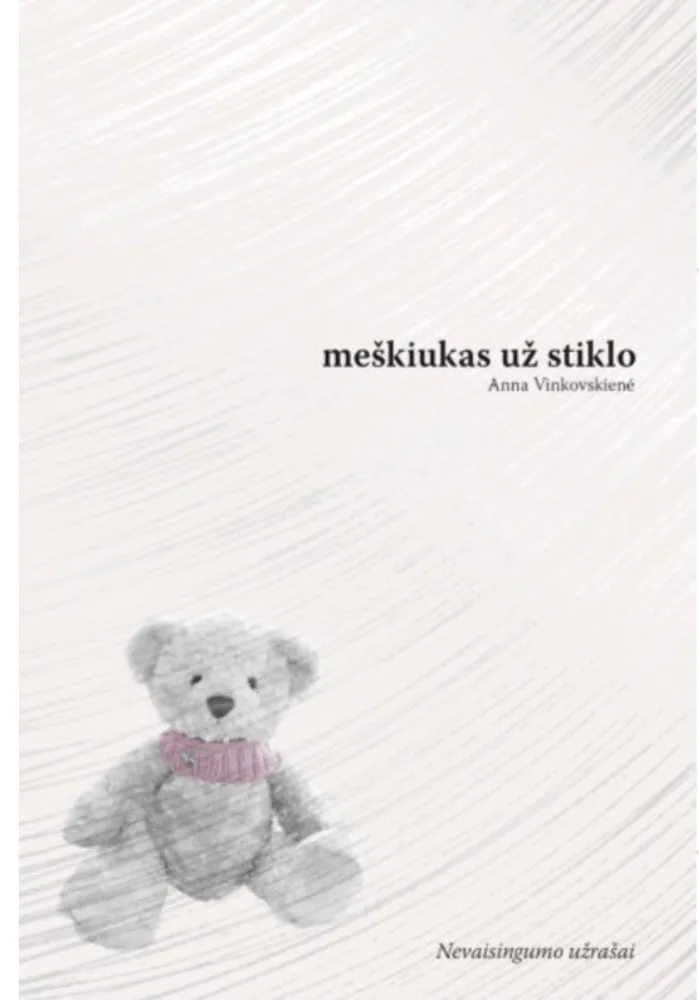 Meškiukas už stiklo