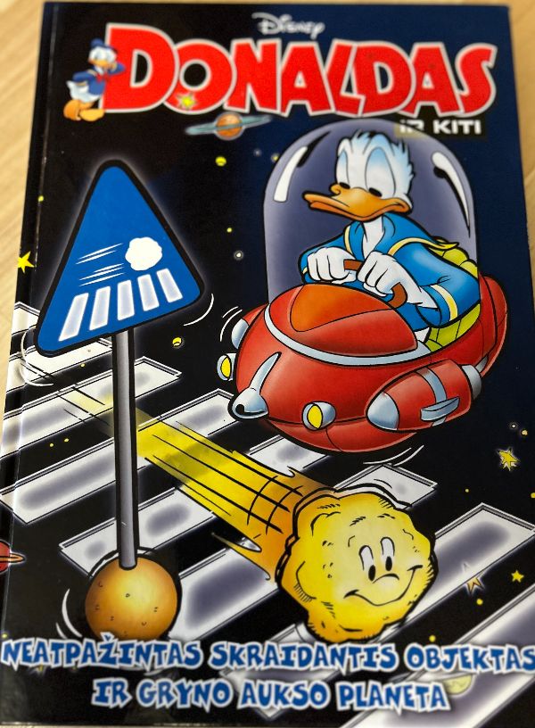 Donaldas ir kiti. Neatpažintas skraidantis objektas ir gryno aukso planeta