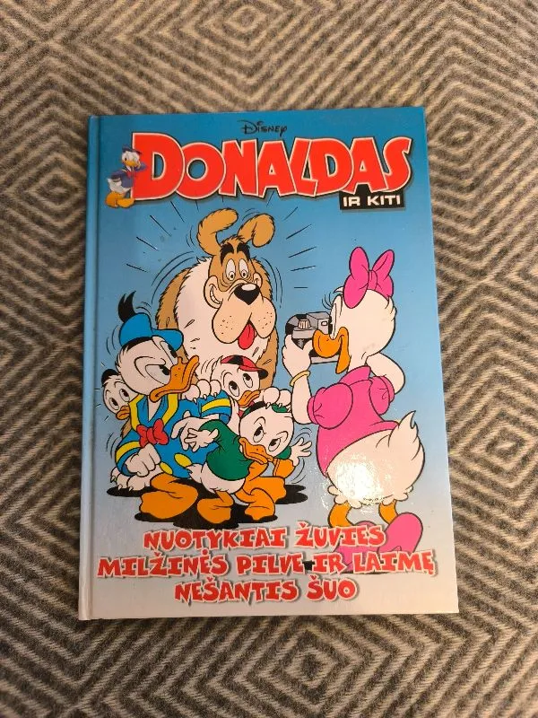 Donaldas ir kiti nuotykiai žuvies milžinės pilve ir laimę nešantis šuo